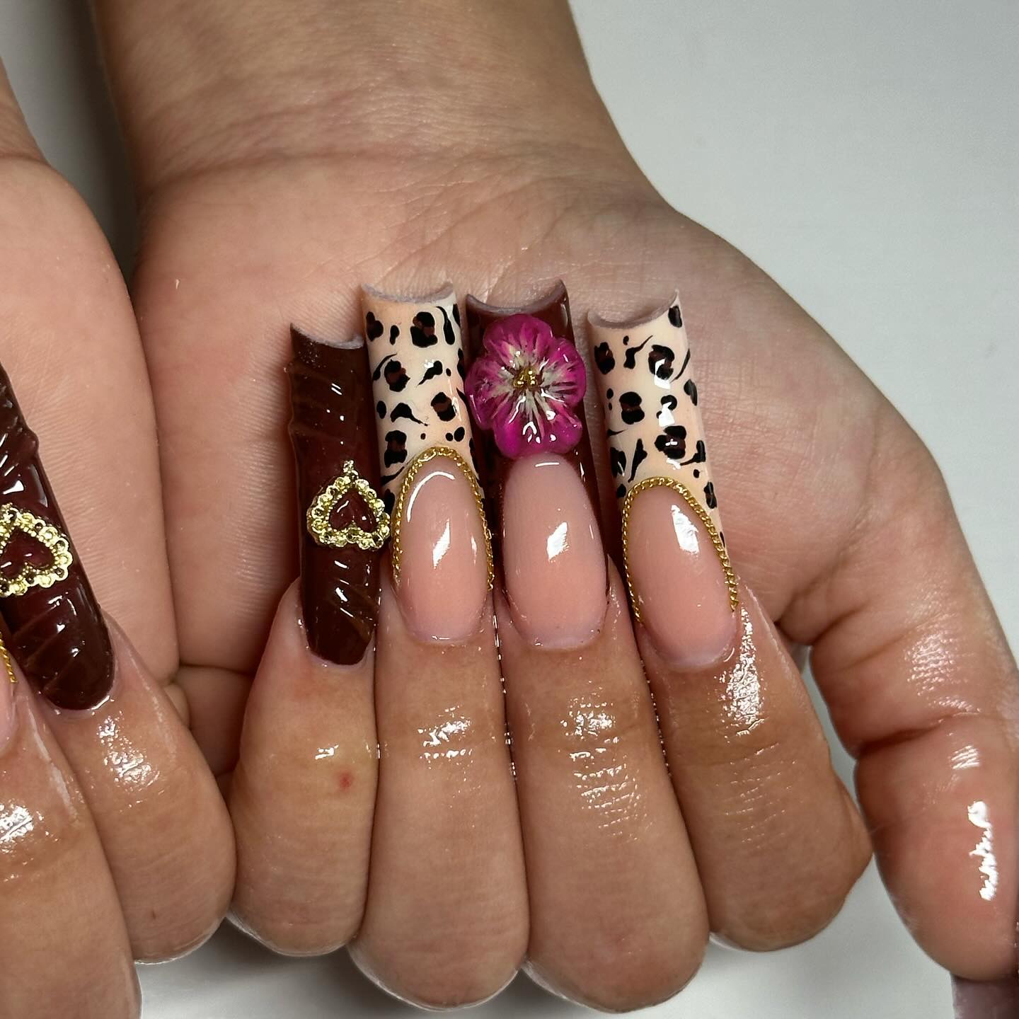 Luxurious Leopard & Pink Floral Nail Art: A Blend of Wild and Sweet