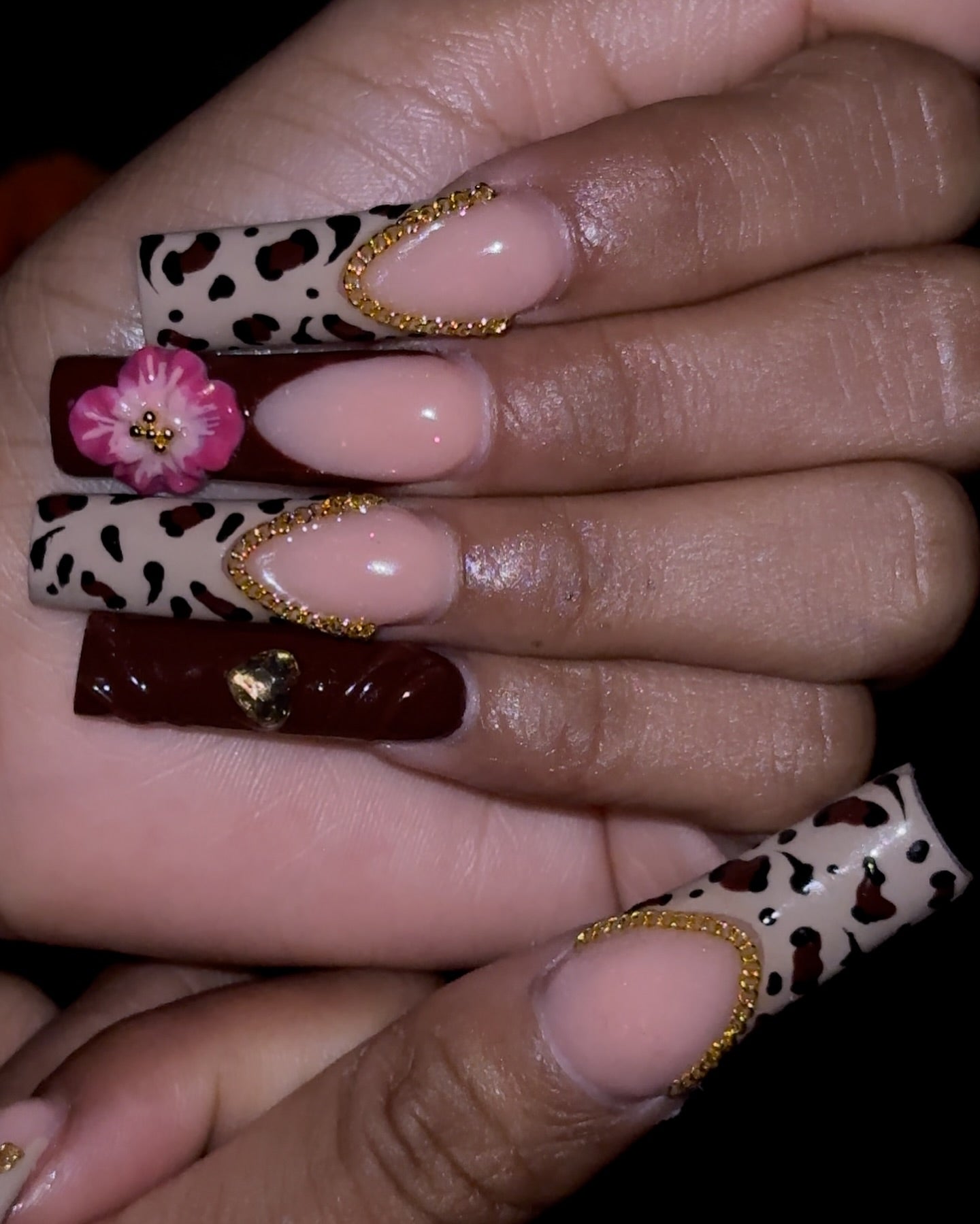 Luxurious Leopard & Pink Floral Nail Art: A Blend of Wild and Sweet