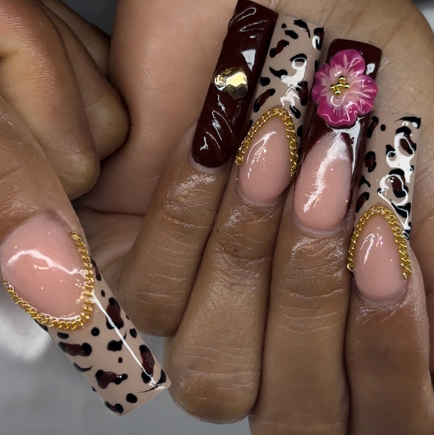 Luxurious Leopard & Pink Floral Nail Art: A Blend of Wild and Sweet